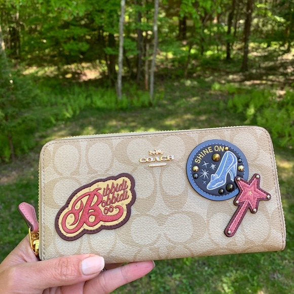 Coach Handbags - SOLD⛔️Authentic COACH sign leather Disney X zip wallet